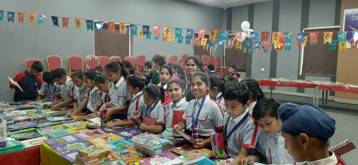 Students in Library Book Fair